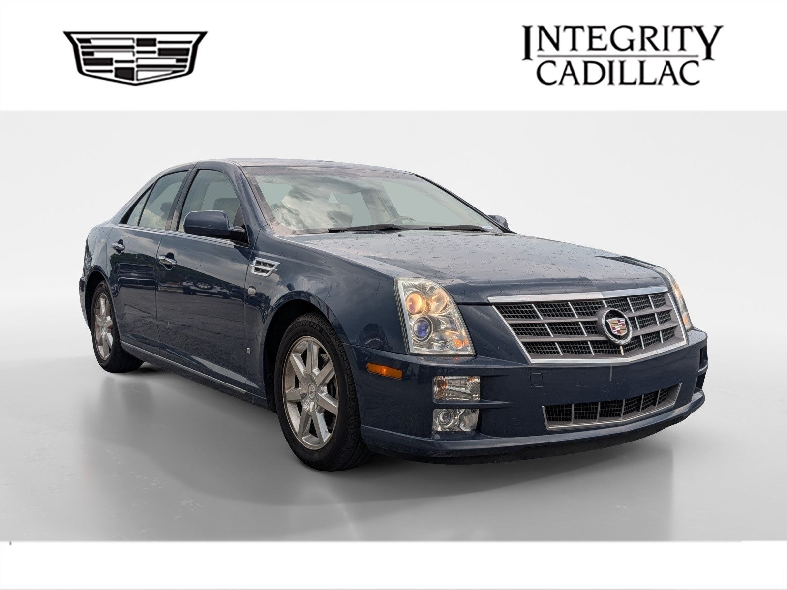 2009 Cadillac STS RWD w/1SB in Blue Diamond Tricoat — front three-quarter view