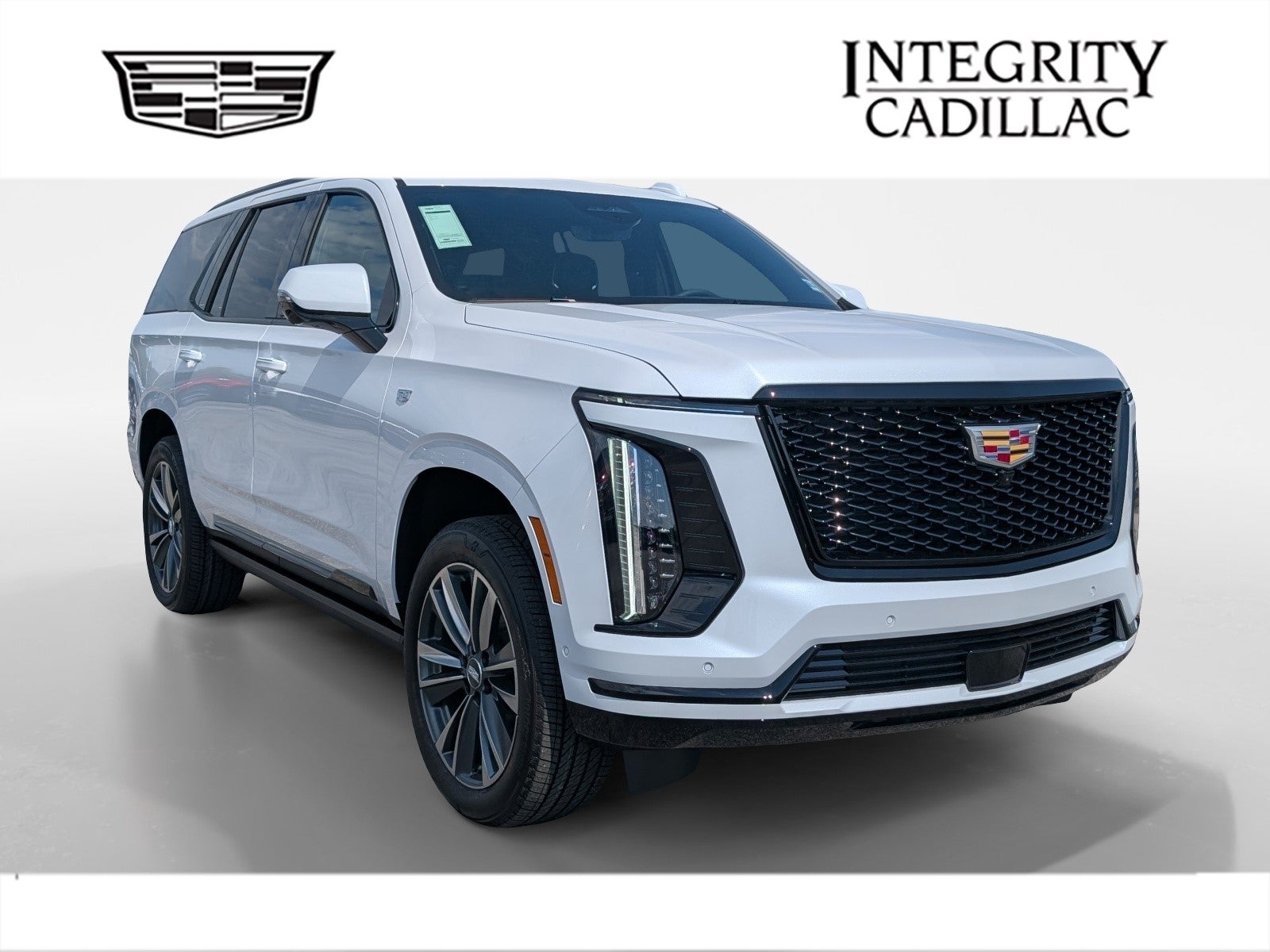 2026 Cadillac Escalade Sport in Vibrant White Tricoat — front three-quarter view