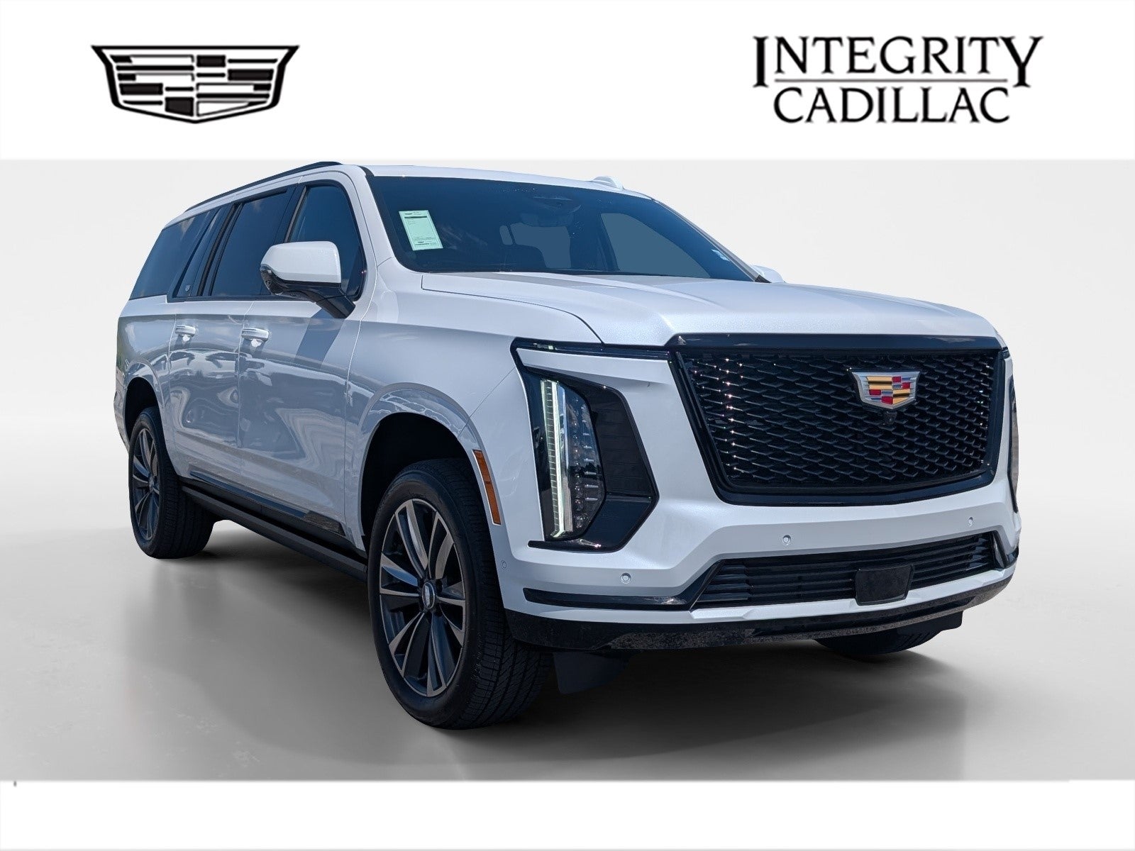 2026 Cadillac Escalade ESV Sport in Vibrant White Tricoat — front three-quarter view